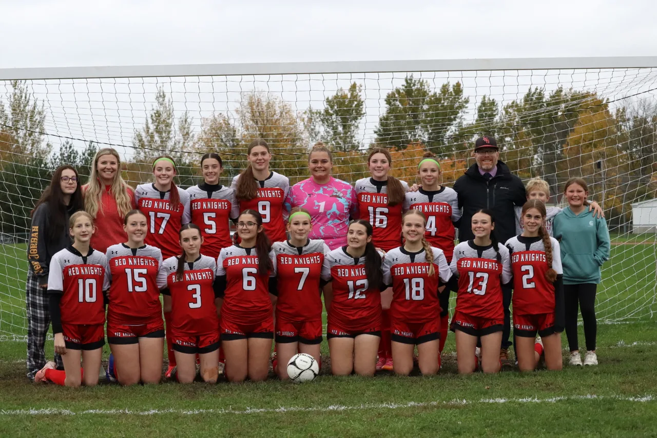 The La Fargeville varsity girls soccer team gathers for a team photograph during senior night.